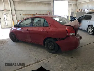 2009 Toyota Yaris with VIN JTDBT903891313898, listed as a Copart auction lot 87820085 with 212,806 mi miles and Salvage Title. Bid and sale history available at carsss.com. Image 2.