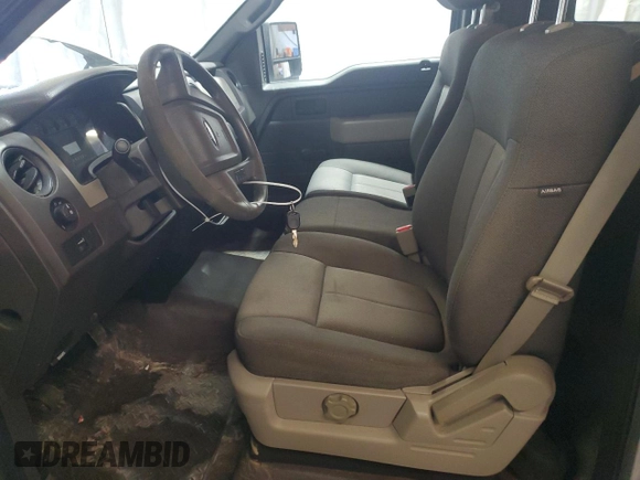 2009 Ford F-150 XL with VIN 1FTVF14V99KB49833, listed as a Copart auction lot 43116685 with 124,541 mi miles and Salvage title. Bid and sale history available at DreamBid. Image 7.