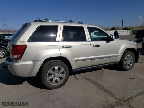 2010 Jeep Grand Cherokee Limited with VIN 1J4RR5GT3AC135686, listed as a Copart auction lot 52961465 with 136,034 mi miles and Salvage Title. Bid and sale history available at carsss.com. Image 3.