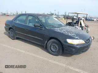 1999 Honda Accord LX with VIN JHMCG665XXC005602, listed as a IAAI auction lot 42058445 with 264,488 mi miles and . Bid and sale history available at DreamBid. Image 1.