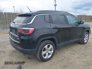 2019 Jeep Compass Latitude z VIN 3C4NJDBB8KT766816, wystawiony jako IAAI lot #41678251 z przebiegiem 143 512 mil mil oraz . Historia ofert i sprzedaży dostępna na DreamBid. Obrazek 4.