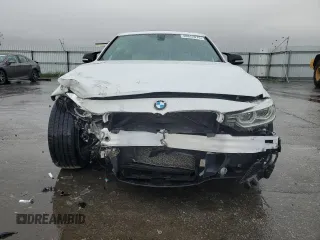 2017 BMW 3 Series 330i with VIN WBA8B9G51HNU09848, listed as a Copart auction lot 48812075 with 105,075 mi miles and Salvage Title. Bid and sale history available at carsss.com. Image 5.