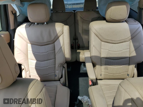 2024 Cadillac XT6 AWD Sport z VIN 1GYKPHRS0RZ724524, wystawiony jako Copart lot #61333185 z przebiegiem 12 799 mil mil oraz Nie do naprawy • Non repairable. Historia ofert i sprzedaży dostępna na DreamBid. Obrazek 10.