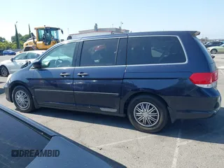 2008 Honda Odyssey LX with VIN 5FNRL38268B025424, listed as a IAAI auction lot 42432326 with 210,644 mi miles and . Bid and sale history available at DreamBid. Image 14.