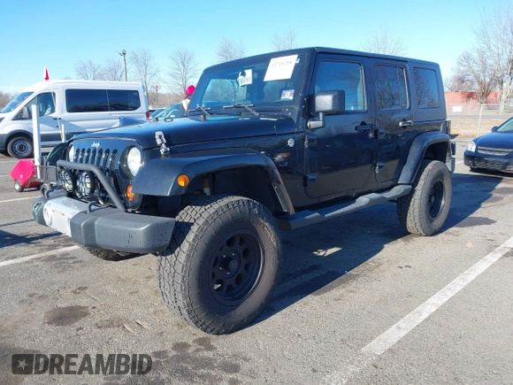 2010 Jeep Wrangler Unlimited Sahara with VIN 1J4HA5H16AL215659, listed as a IAAI auction lot 41749218 with 55,544 mi miles. Bid and sale history available at carsss.com. Image 18.