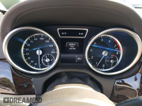 2016 Mercedes-Benz GL with VIN 4JGDF6EE9GA623379, listed as a Copart auction lot 71314214 with 142,745 mi miles and Salvage Title. Bid and sale history available at carsss.com. Image 9.