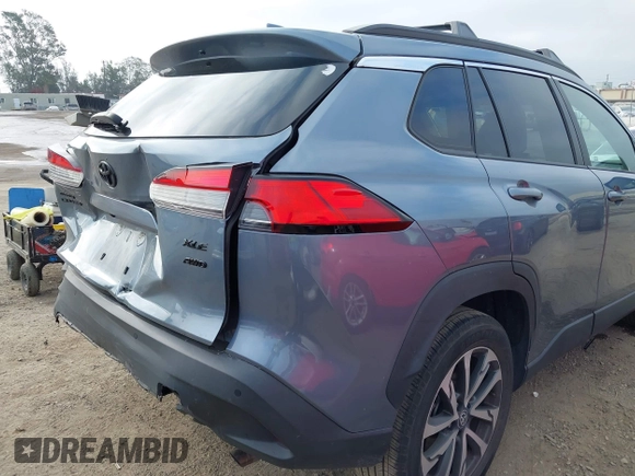 2022 Toyota Corolla Cross XLE with VIN 7MUDAABG6NV007009, listed as a IAAI auction lot 42409061 with 37,178 mi miles and . Bid and sale history available at DreamBid. Image 18.