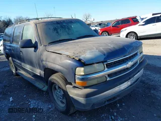 2002 Chevrolet Suburban LT z VIN 1GNEC16Z32J237983, wystawiony jako IAAI lot #41466060 z przebiegiem 260 343 mil mil oraz . Historia ofert i sprzedaży dostępna na DreamBid. Obrazek 1.