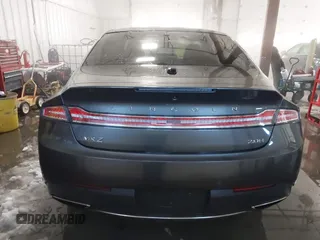 2017 Lincoln MKZ Hybrid Reserve z VIN 3LN6L5MU9HR637908, wystawiony jako IAAI lot #38541395 z przebiegiem 272 691 mil mil oraz . Historia ofert i sprzedaży dostępna na DreamBid. Obrazek 16.