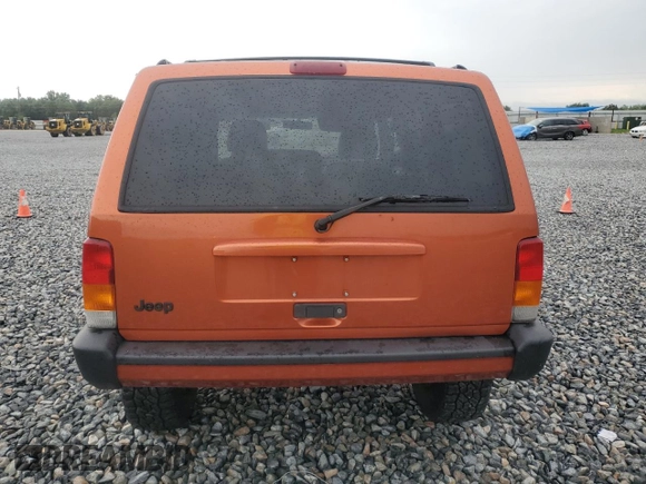1999 Jeep Cherokee Sport with VIN 1J4FF68S7XL560943, listed as a Copart auction lot 58425505 with 68,654 mi miles and Salvage title. Bid and sale history available at DreamBid. Image 6.