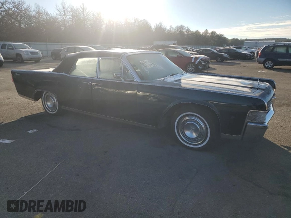 1965 Lincoln Continental with VIN 5Y86N428064, listed as a Copart auction lot 76812744 with 15,659 mi miles and Salvage Title. Bid and sale history available at DreamBid. Image 4.