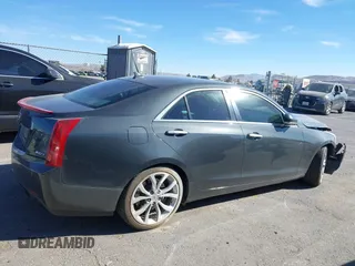 2014 Cadillac ATS Premium with VIN 1G6AE5SX4E0106197, listed as a IAAI auction lot 41720184 with 106,919 mi miles. Bid and sale history available at carsss.com. Image 13.