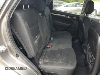 2015 Kia Sorento LX z VIN 5XYKTCA62FG564840, wystawiony jako Copart lot #57957775 z przebiegiem 98 750 mil mil oraz Czysty tytuł • Clean title. Historia ofert i sprzedaży dostępna na DreamBid. Obrazek 11.
