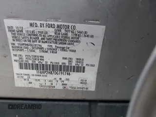 2013 Ford Taurus SEL with VIN 1FAHP2H87DG191746, listed as a IAAI auction lot 40445448 with 231,634 mi miles and . Bid and sale history available at DreamBid. Image 9.