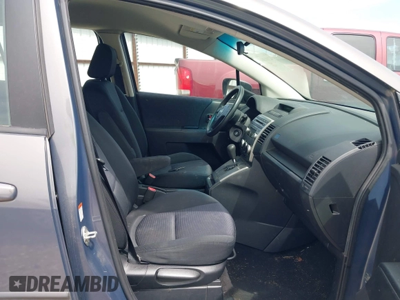 2009 Mazda 5 Touring with VIN JM1CR29LX90333914, listed as a IAAI auction lot 42101304 with 129,470 mi miles. Bid and sale history available at carsss.com. Image 5.