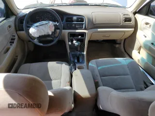1999 Mazda 626 ES with VIN 1YVGF22C1X5896686, listed as a Copart auction lot 72012584 with 123,672 mi miles and Salvage Title. Bid and sale history available at carsss.com. Image 8.