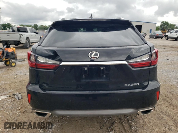 2016 Lexus RX 350 with VIN 2T2ZZMCAXGC010085, listed as a Copart auction lot 58309285 with 70,053 mi miles and Salvage title. Bid and sale history available at DreamBid. Image 6.