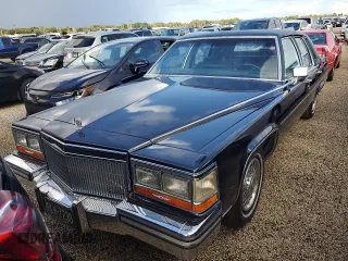 1989 Cadillac Brougham z VIN 1G6DW51Y6KR723841, wystawiony jako Copart lot #74548864 z przebiegiem 74 705 mil mil oraz Szkody całkowita. Historia ofert i sprzedaży dostępna na DreamBid. Obrazek 5.