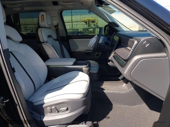 2022 Rivian R1T Launch Edition with VIN 7FCTGAAL1NN010340, listed as a IAAI auction lot 41656762 with 0 mi miles. Bid and sale history available at carsss.com. Image 5.