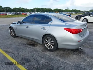 2015 Infiniti Q50 Premium with VIN JN1BV7AP9FM358782, listed as a IAAI auction lot 41103963 with 96,853 mi miles. Bid and sale history available at carsss.com. Image 3.