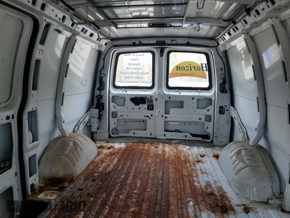 2012 Chevrolet Express Cargo z VIN 1GCSGAFX2C1141147, wystawiony jako Copart lot #54799115 z przebiegiem 286 137 mil mil oraz Czysty tytuł • Clean title. Historia ofert i sprzedaży dostępna na DreamBid. Obrazek 10.