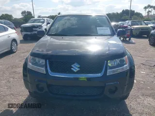 2008 Suzuki Grand Vitara with VIN JS3TE941284102380, listed as a IAAI auction lot 42061609 with 103,554 mi miles and . Bid and sale history available at DreamBid. Image 12.