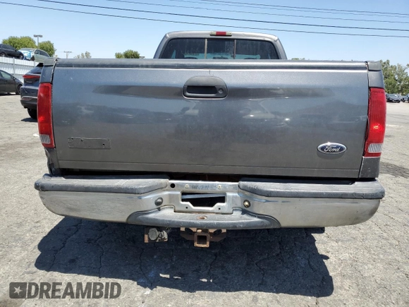2004 Ford F-250 XL with VIN 1FTNX20L64EB19073, listed as a Copart auction lot 57533145 with 287,118 mi miles and Salvage title. Bid and sale history available at DreamBid. Image 6.