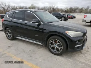 2017 BMW X1 xDrive28i with VIN WBXHT3C35H5F68752, listed as a Copart auction lot 49414675 with 114,308 mi miles and Clean Title. Bid and sale history available at carsss.com. Image 4.