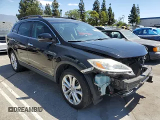 2012 Mazda CX-9 Grand Touring with VIN JM3TB2DV3C0365678, listed as a Copart auction lot 64258875 with 139,274 mi miles and Salvage title. Bid and sale history available at DreamBid. Image 4.