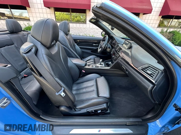 2015 BMW M4 with VIN WBS3U9C56FP967640, listed as a Copart auction lot 63641785 with 31,516 mi miles and Salvage title. Bid and sale history available at DreamBid. Image 5.