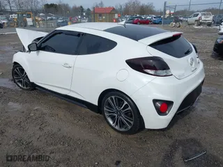 2016 Hyundai Veloster Turbo with VIN KMHTC6AE6GU275727, listed as a IAAI auction lot 41743920 with 94,893 mi miles. Bid and sale history available at carsss.com. Image 3.