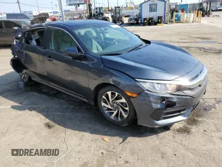2016 Honda Civic EX with VIN 19XFC2F70GE214585, listed as a Copart auction lot 55607165 with 148,528 mi miles and Salvage Title. Bid and sale history available at DreamBid. Image 4.