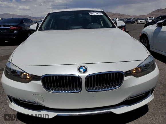 2013 BMW 3 Series 328i z VIN WBA3C1C53DF444720, wystawiony jako Copart lot #54775275 z przebiegiem 71 603 mil mil oraz Szkody całkowita. Historia ofert i sprzedaży dostępna na DreamBid. Obrazek 5.