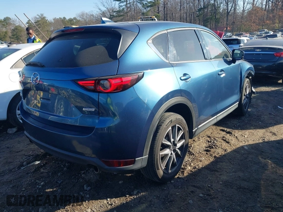 2018 Mazda CX-5 Grand Touring with VIN JM3KFADM9J1328501, listed as a IAAI auction lot 41408154 with 116,679 mi miles. Bid and sale history available at carsss.com. Image 4.