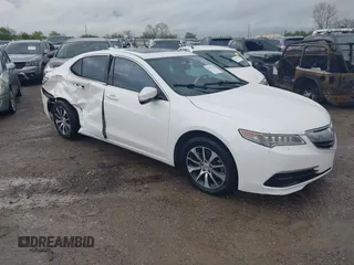 2015 Acura TLX with VIN 19UUB1F39FA020674, listed as a IAAI auction lot 41964784 with 98,579 mi miles and . Bid and sale history available at carsss.com. Image 1.