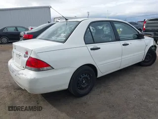 2004 Mitsubishi Lancer ES with VIN JA3AJ26E74U060371, listed as a IAAI auction lot 41636927 with 165,456 mi miles. Bid and sale history available at carsss.com. Image 4.