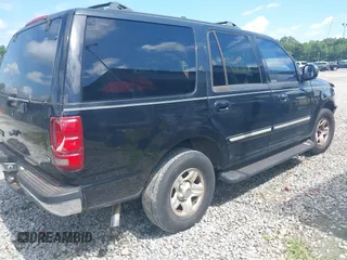 1998 Ford Expedition XLT with VIN 1FMRU176XWLB30950, listed as a IAAI auction lot 42704595 with 303,838 mi miles and . Bid and sale history available at DreamBid. Image 4.