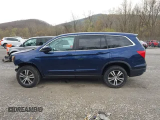 2016 Honda Pilot EX-L with VIN 5FNYF6H55GB050991, listed as a IAAI auction lot 41943049 with 158,255 mi miles. Bid and sale history available at carsss.com. Image 14.