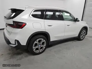 2023 BMW X1 xDrive28i with VIN WBX73EF00P5X20800, listed as a Copart auction lot 53166625 with 27,545 mi miles and Clean Title. Bid and sale history available at carsss.com. Image 3.