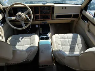 1993 Jeep Cherokee Country with VIN 1J4FJ78S4PL517648, listed as a Copart auction lot 72383564 with 127,156 mi miles and Salvage Title. Bid and sale history available at carsss.com. Image 8.