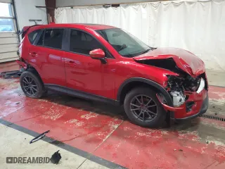 2016 Mazda CX-5 Touring with VIN JM3KE4CY0G0803265, listed as a Copart auction lot 51362065 with 84,955 mi miles and Salvage Title. Bid and sale history available at carsss.com. Image 4.