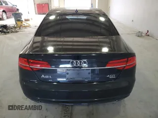 2016 Audi A8 Sport z VIN WAU43AFD1GN011589, wystawiony jako Copart lot #86614934 z przebiegiem 96 137 mil mil oraz Szkoda całkowita • Salvage title. Historia ofert i sprzedaży dostępna na DreamBid. Obrazek 6.