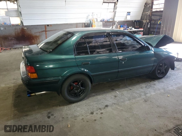 1996 Toyota Tercel DX z VIN JT2BC52L7T7044201, wystawiony jako Copart lot #77190074 z przebiegiem Nie podano mil oraz Szkoda całkowita • Salvage title. Historia ofert i sprzedaży dostępna na DreamBid. Obrazek 3.