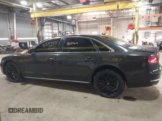 2012 Audi A8 z VIN WAURVAFD6CN014546, wystawiony jako IAAI lot #41357932 z przebiegiem 93 516 mil mil oraz . Historia ofert i sprzedaży dostępna na DreamBid. Obrazek 14.