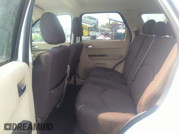2008 Mazda Tribute Touring with VIN 4F2CZ96138KM32735, listed as a IAAI auction lot 31145122 with 206,608 mi miles and . Bid and sale history available at DreamBid. Image 8.