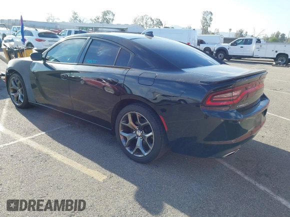 2015 Dodge Charger SXT with VIN 2C3CDXHG9FH915191, listed as a IAAI auction lot 41850427 with 164,535 mi miles and . Bid and sale history available at DreamBid. Image 3.