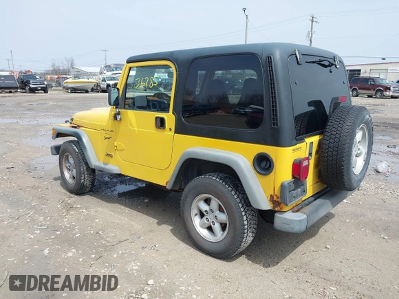 2000 Jeep Wrangler Sport with VIN 1J4FA49S2YP768451, listed as a IAAI auction lot 42136785 with 74,492 mi miles. Bid and sale history available at carsss.com. Image 3.