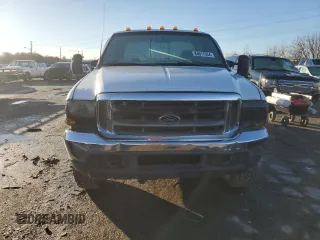 1999 Ford F-250 XL with VIN 1FTNX21S8XEC58955, listed as a Copart auction lot 84917334 with 272,953 mi miles and Salvage title. Bid and sale history available at DreamBid. Image 5.