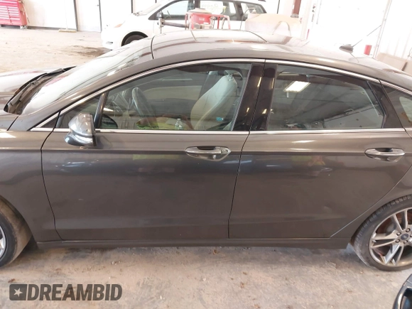 2016 Ford Fusion Titanium with VIN 3FA6P0D9XGR223354, listed as a IAAI auction lot 42621924 with Not provided miles and . Bid and sale history available at DreamBid. Image 14.