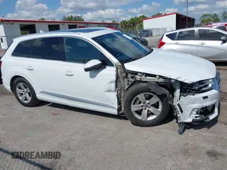 2018 Audi Q7 Premium z VIN WA1AHAF77JD045349, wystawiony jako IAAI lot #42227264 z przebiegiem 93 865 mil mil oraz . Historia ofert i sprzedaży dostępna na DreamBid. Obrazek 13.